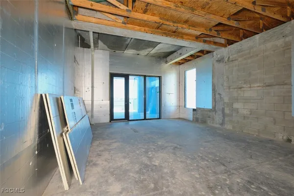 an aerial view of a house with lake view