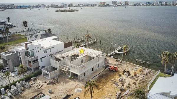 an aerial view of ocean with residential space