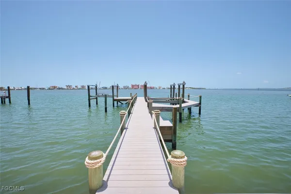 a view of a lake with a large bridge