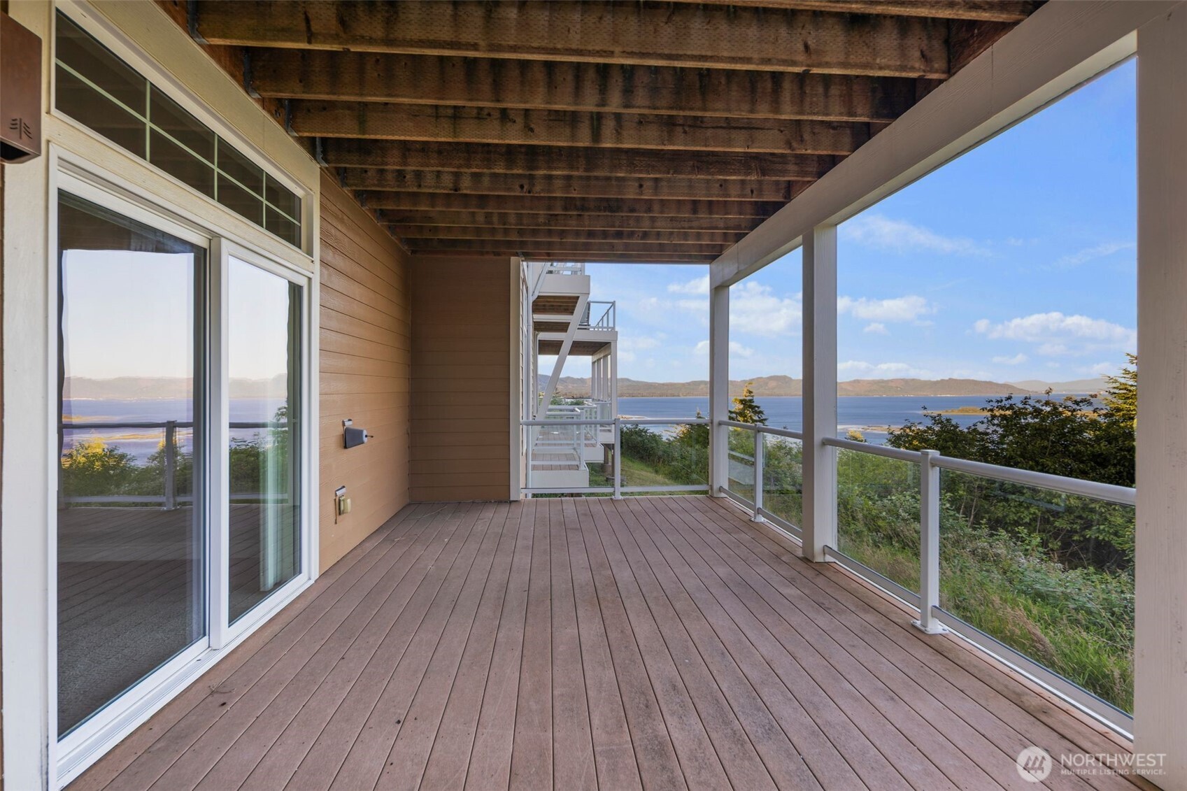3224 Overlook Loop Ilwaco, WA 98624 - Photo 31 of 38 a porch with seating space