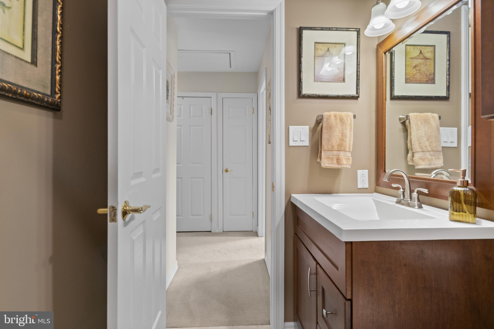 24 Jacob Court Ewing, NJ 08628 - Photo 23 of 31 Hallway bath vanity