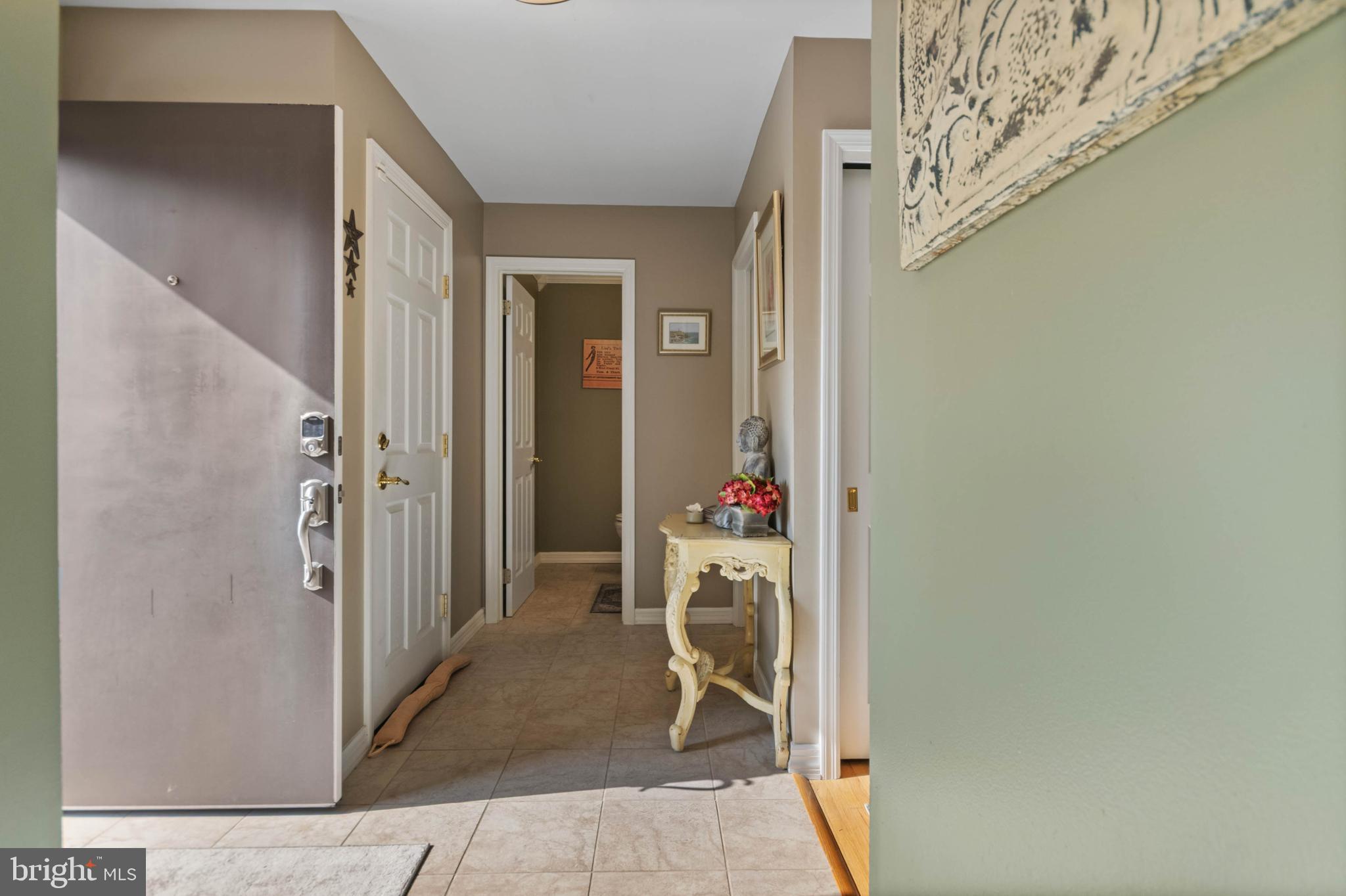 24 Jacob Court Ewing, NJ 08628 - Photo 5 of 31 Left Hallway,G-door,Powder R, Utility Room
