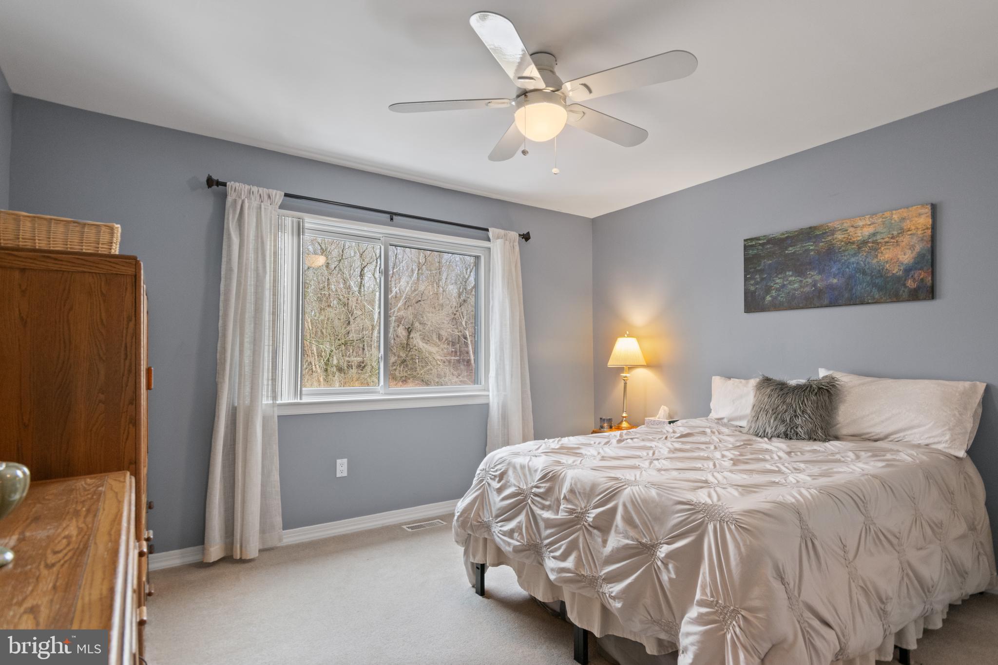 24 Jacob Court Ewing, NJ 08628 - Photo 9 of 14 a bedroom with a bed and a window