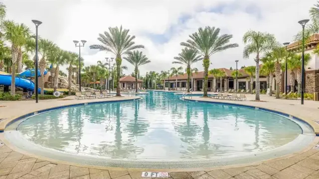 swimming pool with an outdoor seating