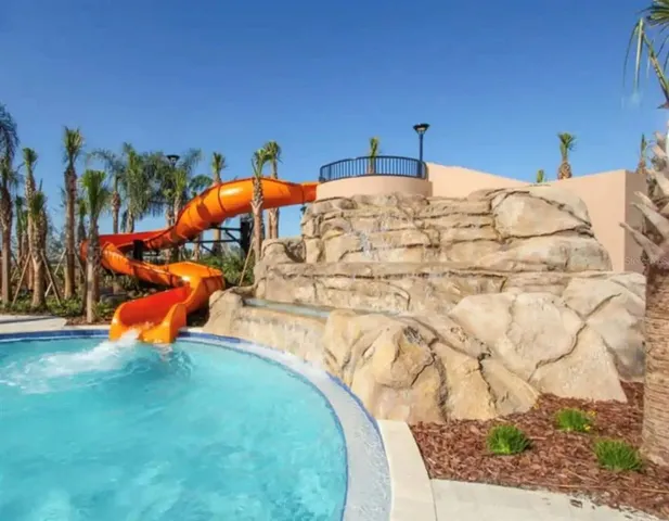 a view of a lake with a yard