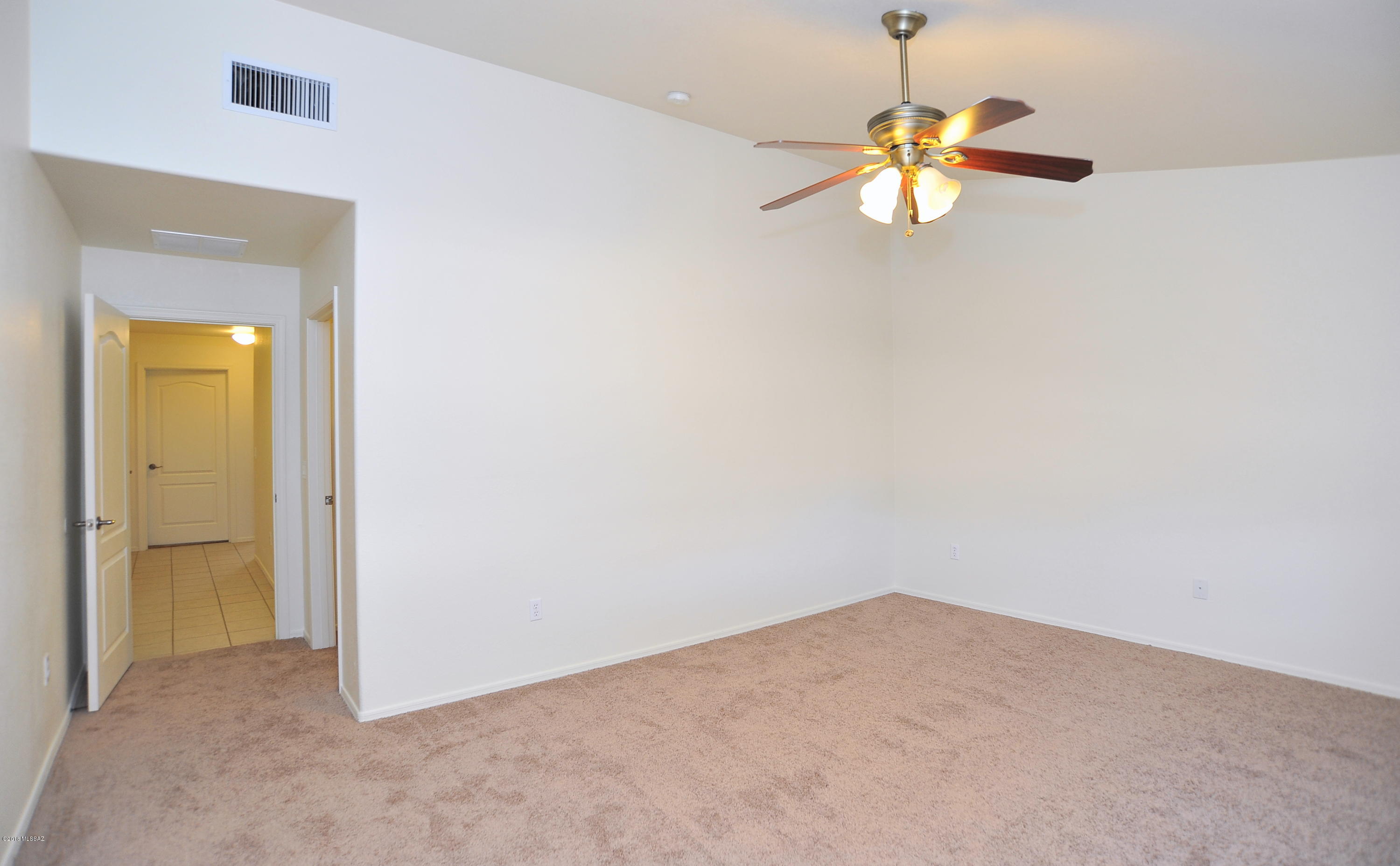 558 West Chatfield Street Vail, AZ 85641 - Photo 20 of 31 a view of a chandelier fan and a window