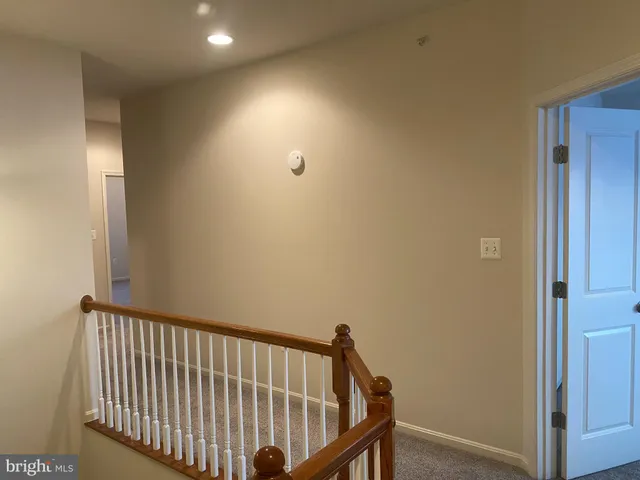 a view of hallway with closet