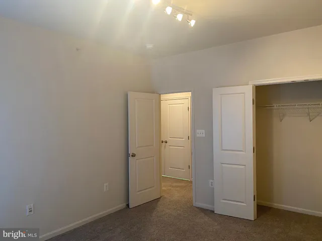 an empty room with a bathroom
