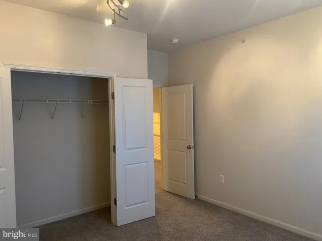 an empty room with a bathroom