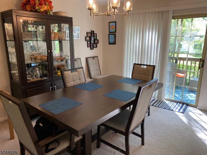 15 Starling Way Berkeley Heights, NJ 07922 - Photo 14 of 21 a view of a dining room with furniture and wooden floor