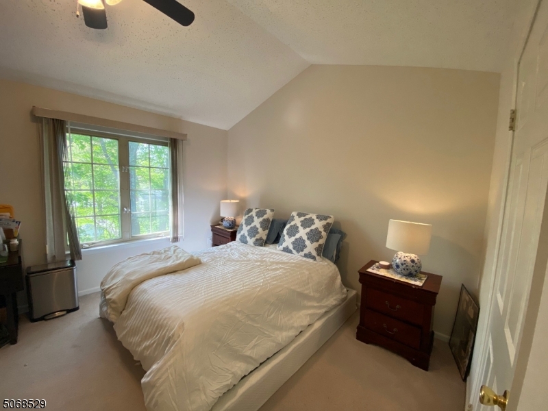 15 Starling Way Berkeley Heights, NJ 07922 - Photo 17 of 21 a bedroom with a bed and wooden floor