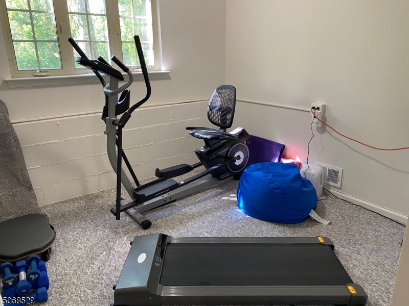 15 Starling Way Berkeley Heights, NJ 07922 - Photo 20 of 21 a room with gym equipment