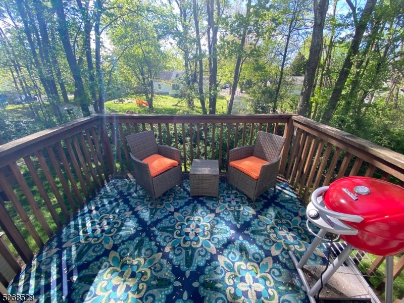 15 Starling Way Berkeley Heights, NJ 07922 - Photo 2 of 21 a backyard of a house with outdoor seating