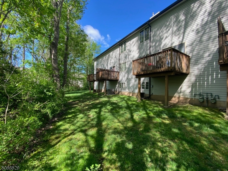 15 Starling Way Berkeley Heights, NJ 07922 - Photo 5 of 21 a view of a house with a small yard
