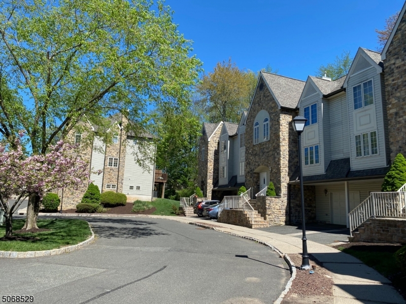 15 Starling Way Berkeley Heights, NJ 07922 - Photo 7 of 21 a building with trees in front of it