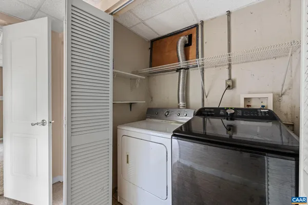 a kitchen that has a sink and a window