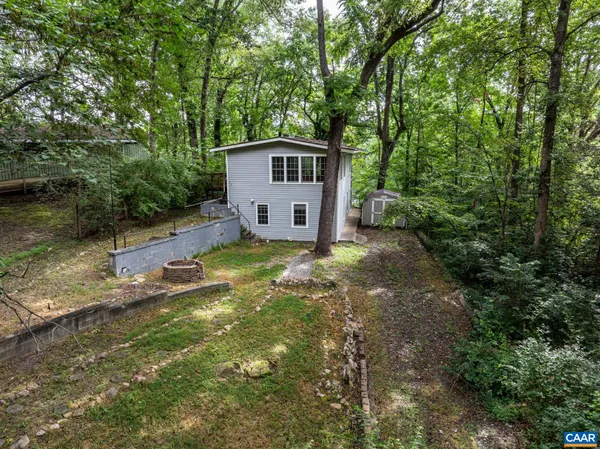 a house with trees in front of it