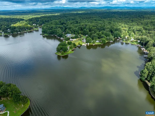 a view of a lake with a yard
