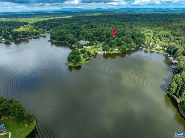 a view of a lake with a yard