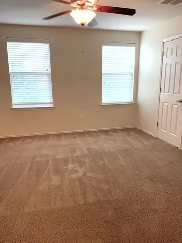 an empty room with windows