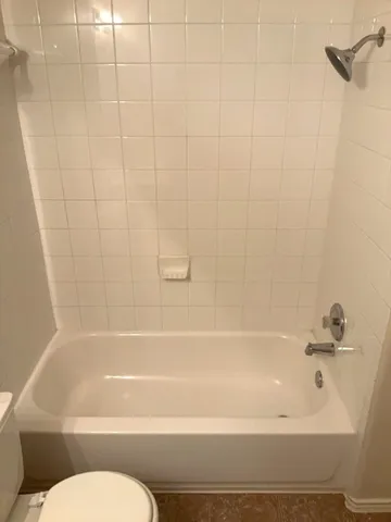 a bathroom with a sink and a bathtub