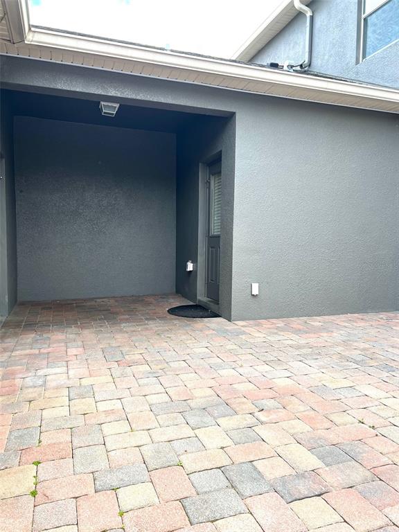 7681 Fordson Lane Windermere, FL 34786 - Photo 16 of 17 a view of a livingroom with an empty space and a window