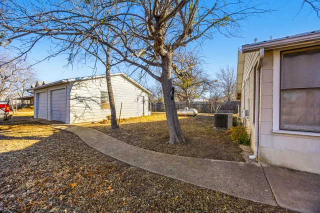 a view of house with outdoor space
