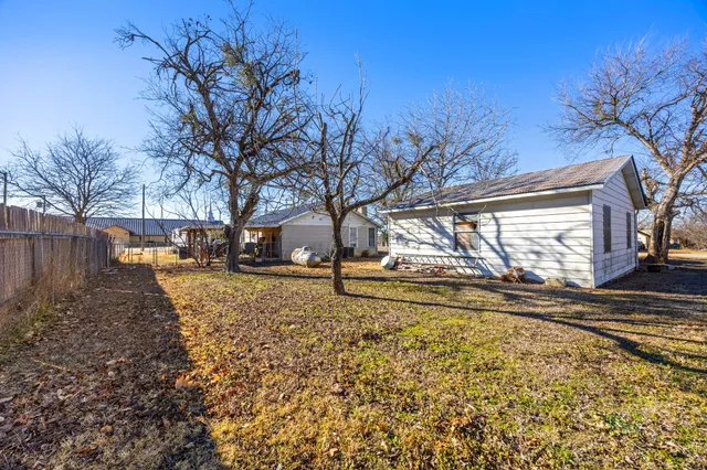 swimming pool view with a outdoor seating