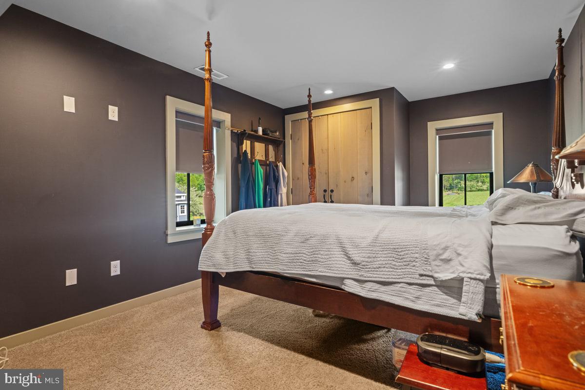 13 Rope Walk Road Upper Black Eddy, PA 18972 - Photo 13 of 40 a bedroom with a bed dresser and a window