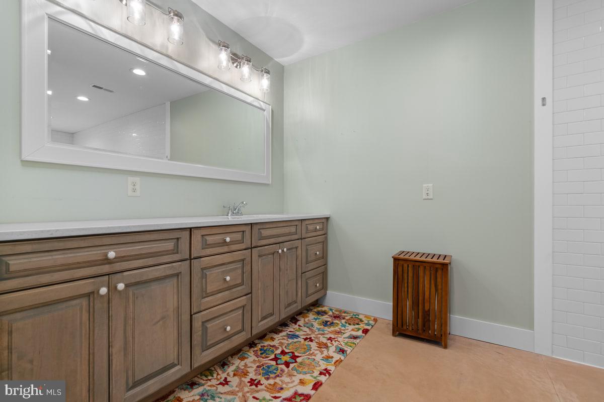 13 Rope Walk Road Upper Black Eddy, PA 18972 - Photo 14 of 40 a spacious bathroom with a sink and a mirror