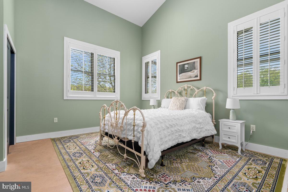 13 Rope Walk Road Upper Black Eddy, PA 18972 - Photo 16 of 40 a bedroom with a bed lamp and a window
