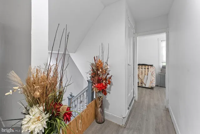 a view of entryway with wooden floor