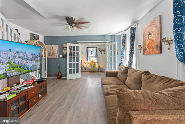 a living room with furniture and a area