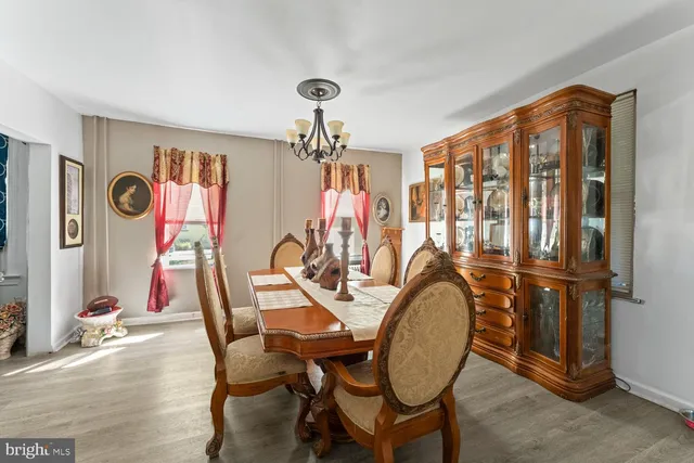 a view of a livingroom with furniture and a window