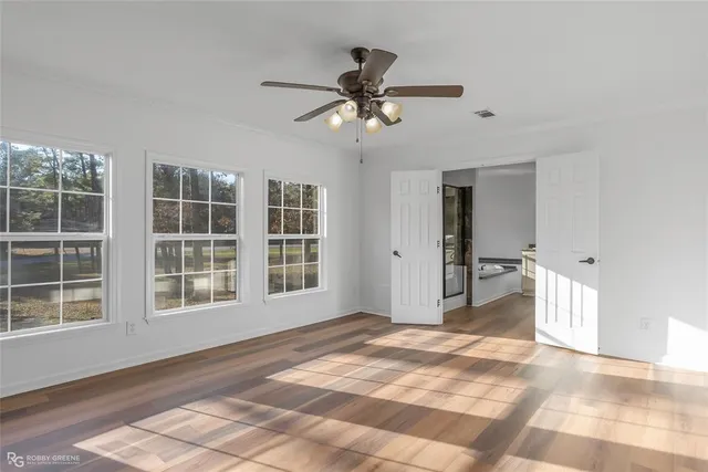 a bathroom with a sink vanity and a mirror