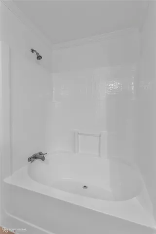 a backyard of a house with trees and covered with wooden fence