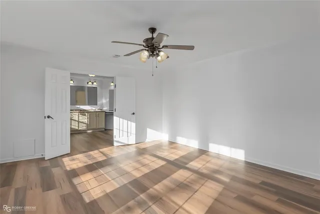 a kitchen with a sink stainless steel appliances and cabinets