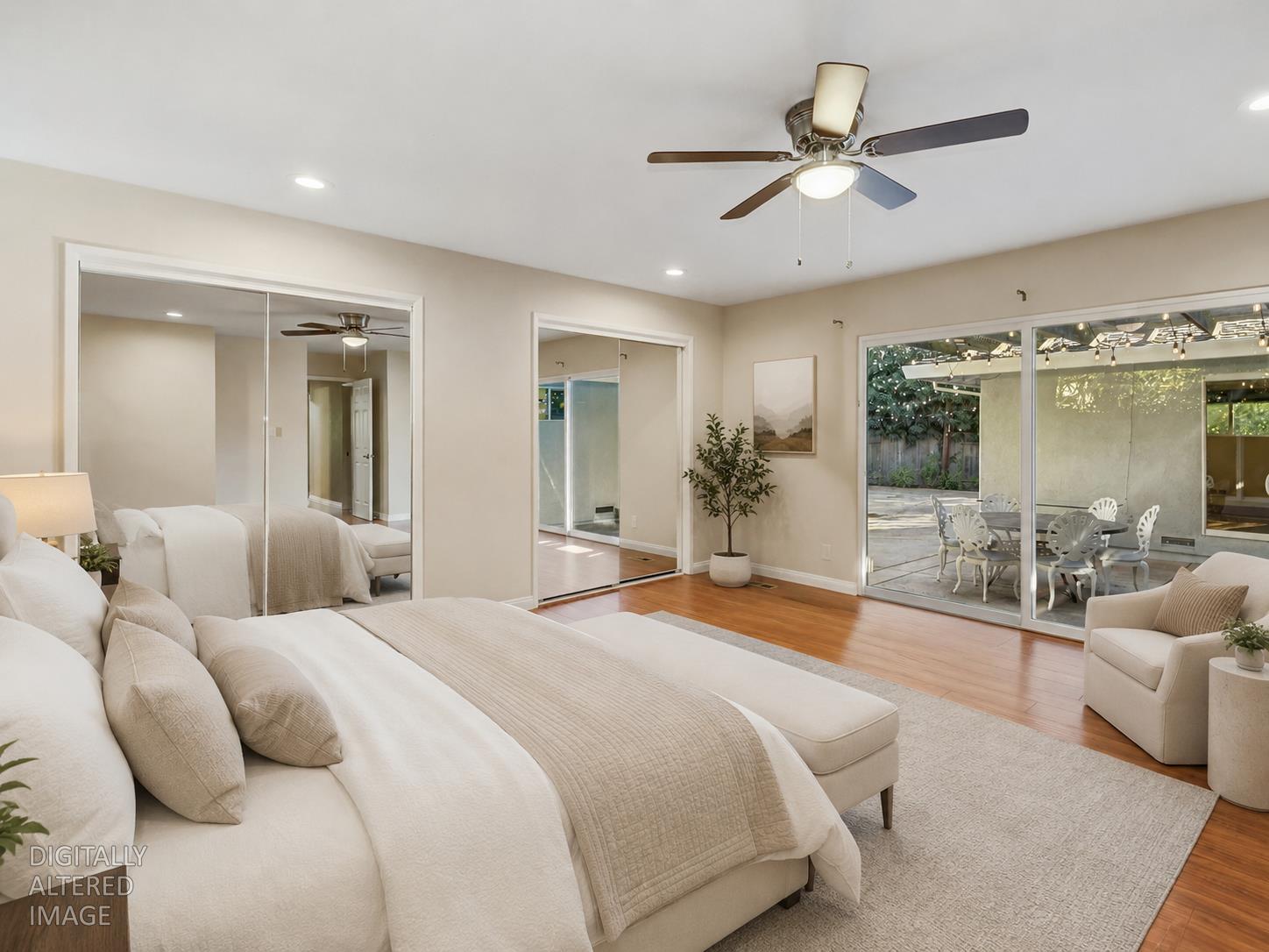 1540 Gregory Way Carmichael, CA 95608 - Photo 27 of 76 a bedroom with a large bed and a chandelier