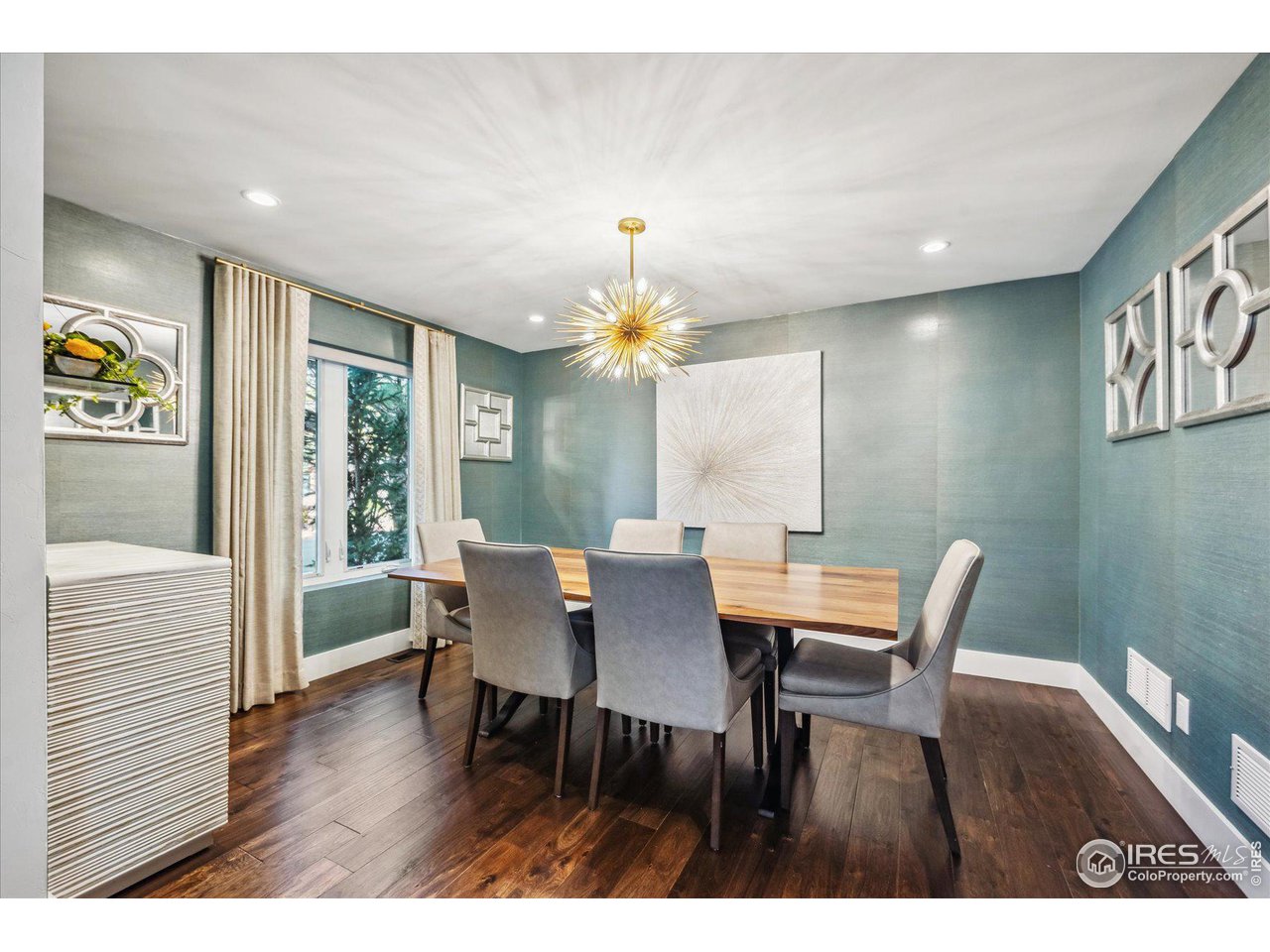 1920 Vista Drive Boulder, CO 80304 - Photo 14 of 38 a view of a dining room with furniture and wooden floor