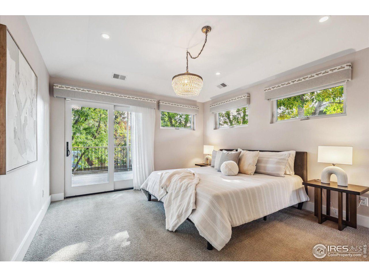 1920 Vista Drive Boulder, CO 80304 - Photo 18 of 38 a bedroom with a bed window and ceiling fan