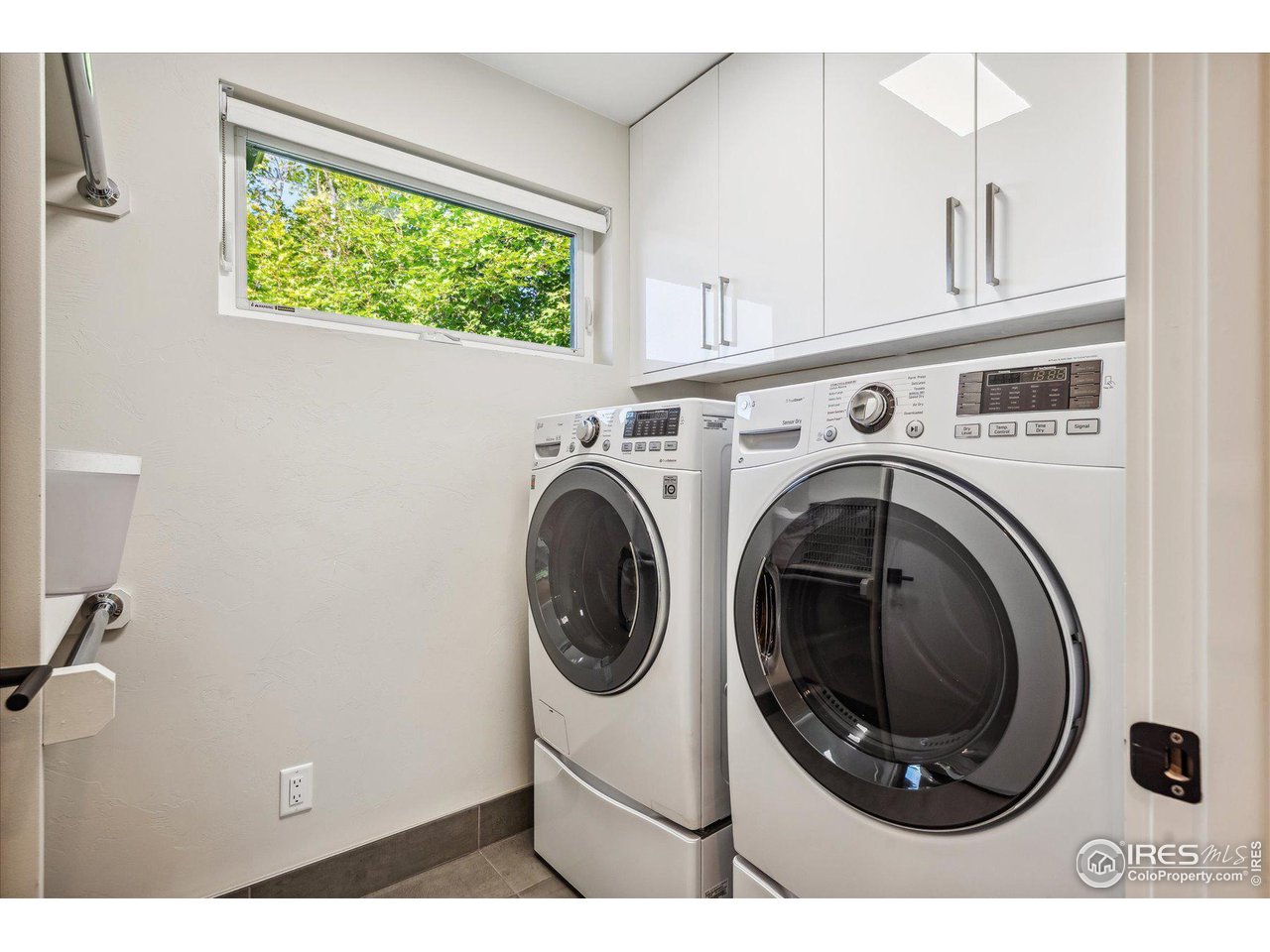 1920 Vista Drive Boulder, CO 80304 - Photo 26 of 38 a utility room with dryer and washer
