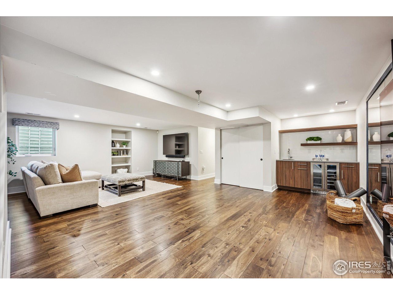 1920 Vista Drive Boulder, CO 80304 - Photo 27 of 38 a living room with furniture and a wooden floor