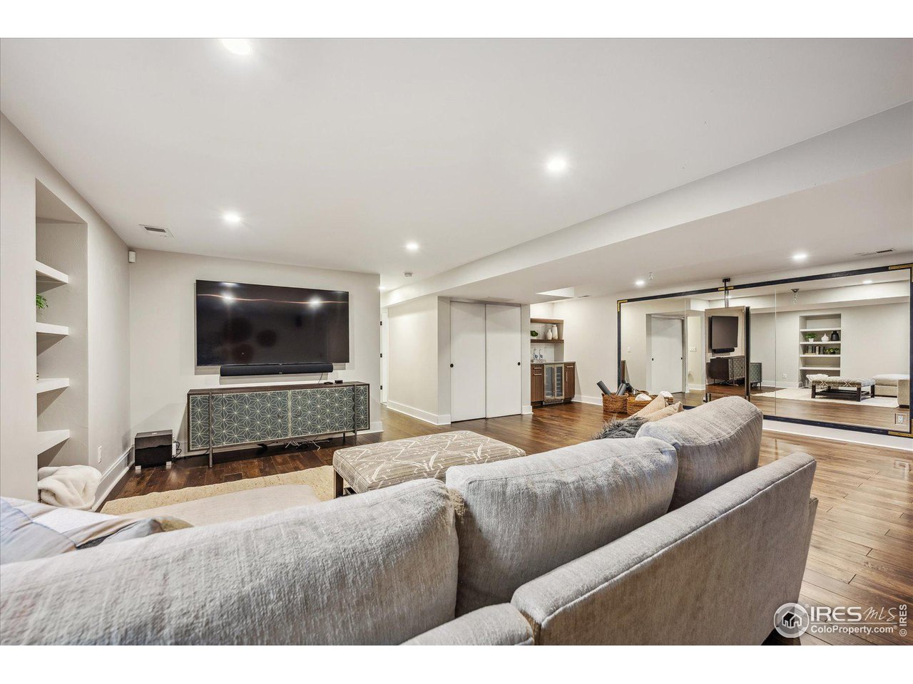 1920 Vista Drive Boulder, CO 80304 - Photo 28 of 38 a living room with furniture and a flat screen tv