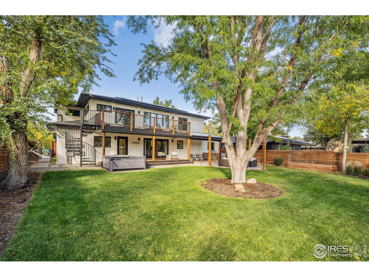 1920 Vista Drive Boulder, CO 80304 - Photo 35 of 38 a view of a house with garden and trees