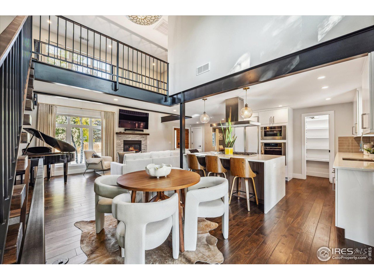 1920 Vista Drive Boulder, CO 80304 - Photo 8 of 38 a dining room with furniture and wooden floor