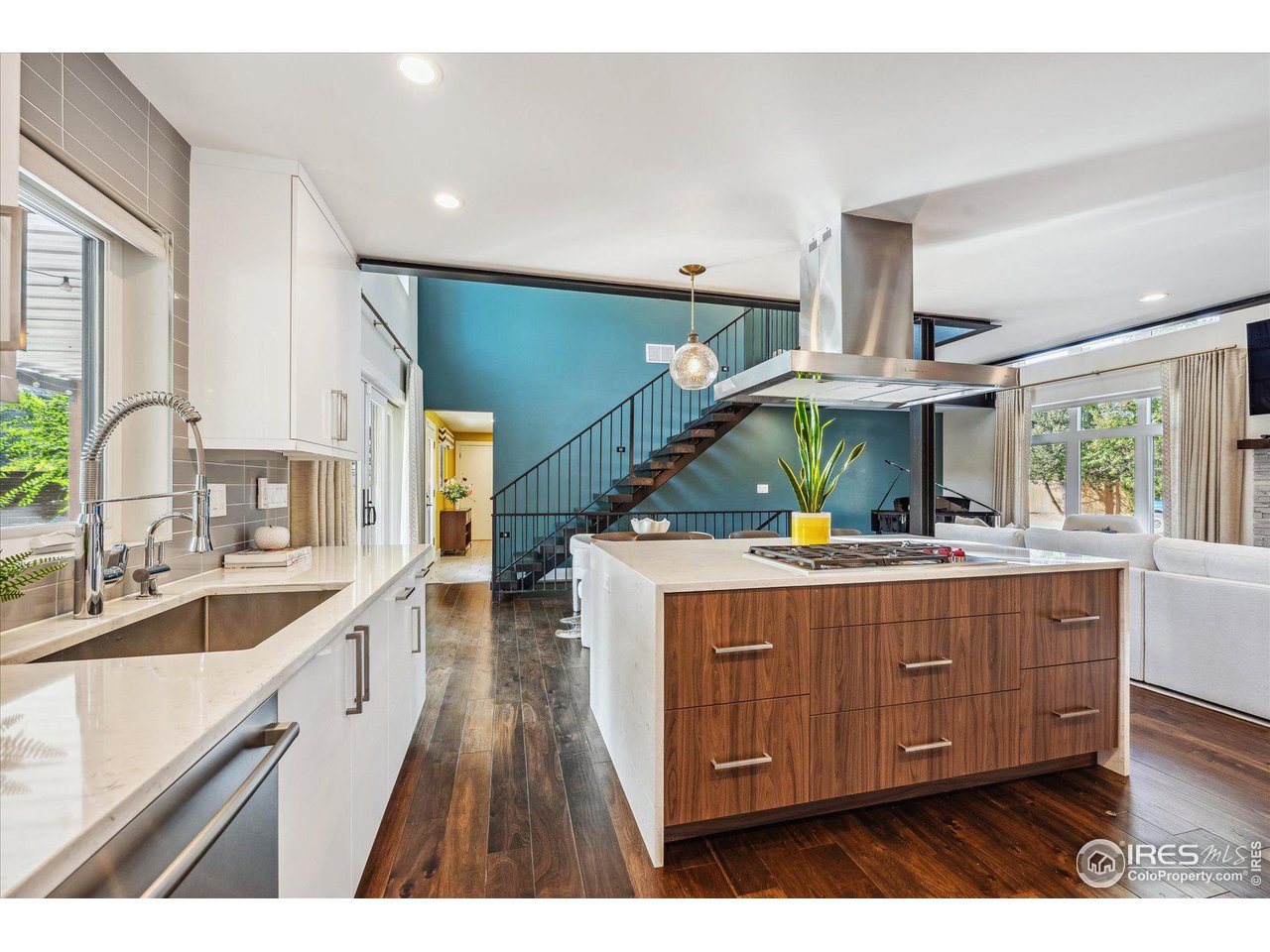 1920 Vista Drive Boulder, CO 80304 - Photo 10 of 38 a kitchen with kitchen island granite countertop a sink stainless steel appliances and cabinets