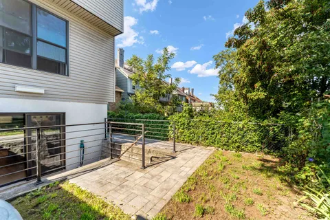 a backyard of a house with lots of green space