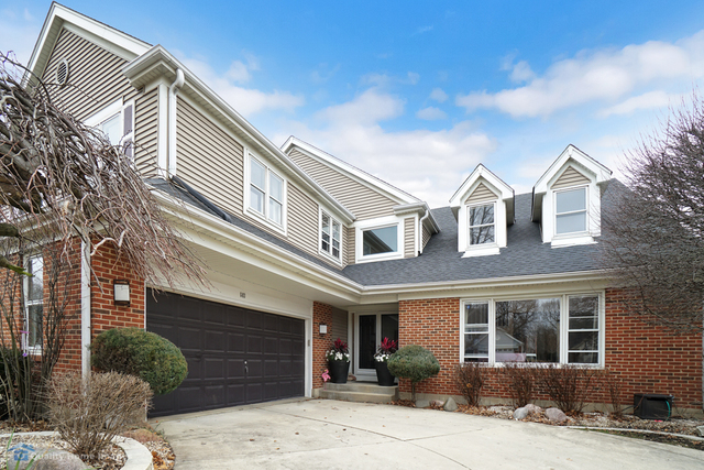 603 Raintree Road Buffalo Grove, IL 60089 - Photo 1 of 20 a view of a white building among the street