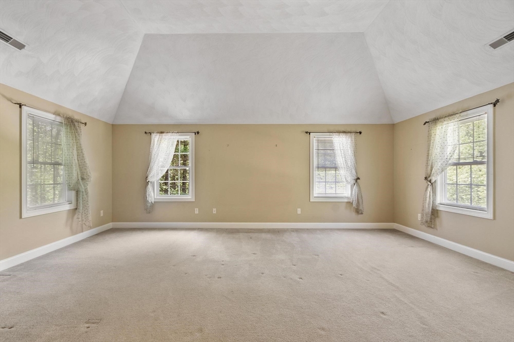 4 Forest Street Georgetown, MA 01833 - Photo 19 of 37 a view of an empty room with a window