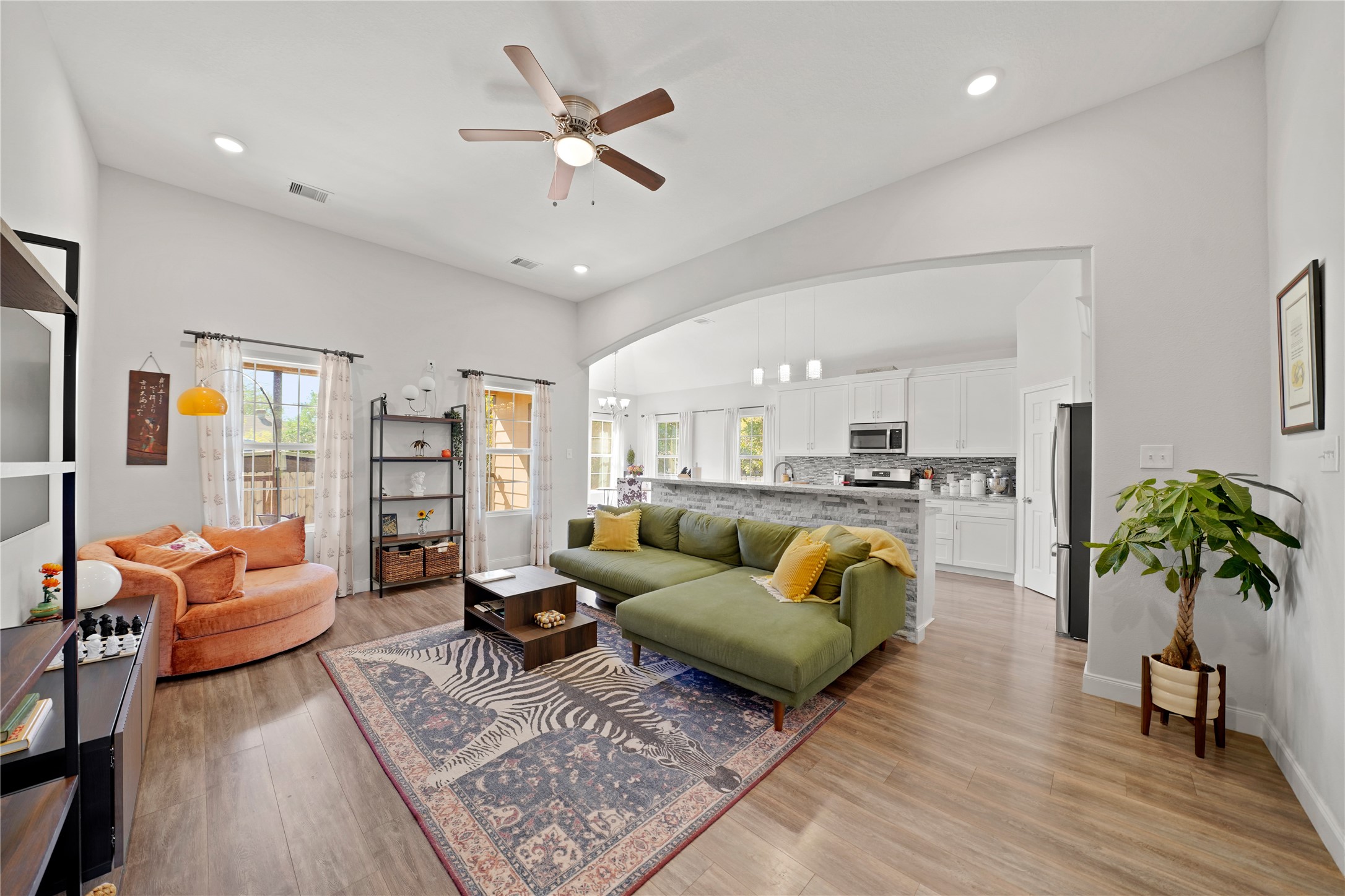 5602 Belmark Street Houston, TX 77033 - Photo 6 of 27 a living room with furniture and wooden floor